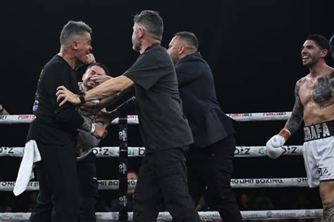 define melee|Boxer’s brother punches rival’s trainer in chaotic post .